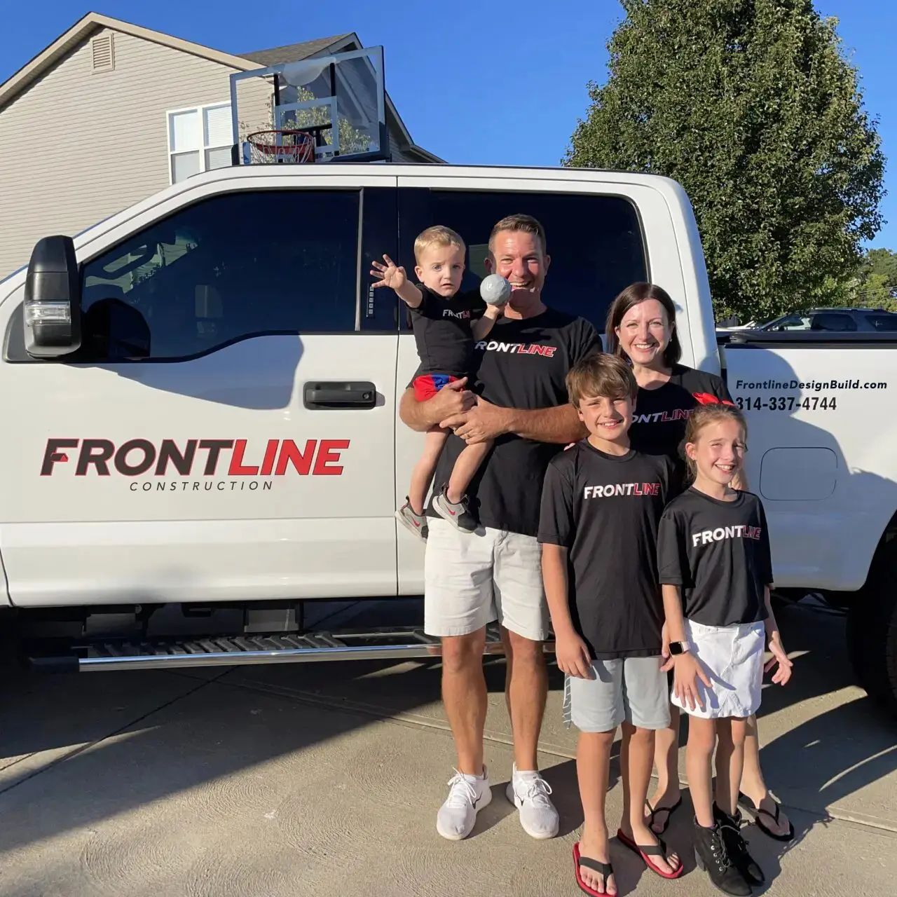 The Mayer family with the Frontline truck